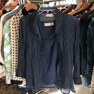 Navy with white polka dots blouse over navy shell